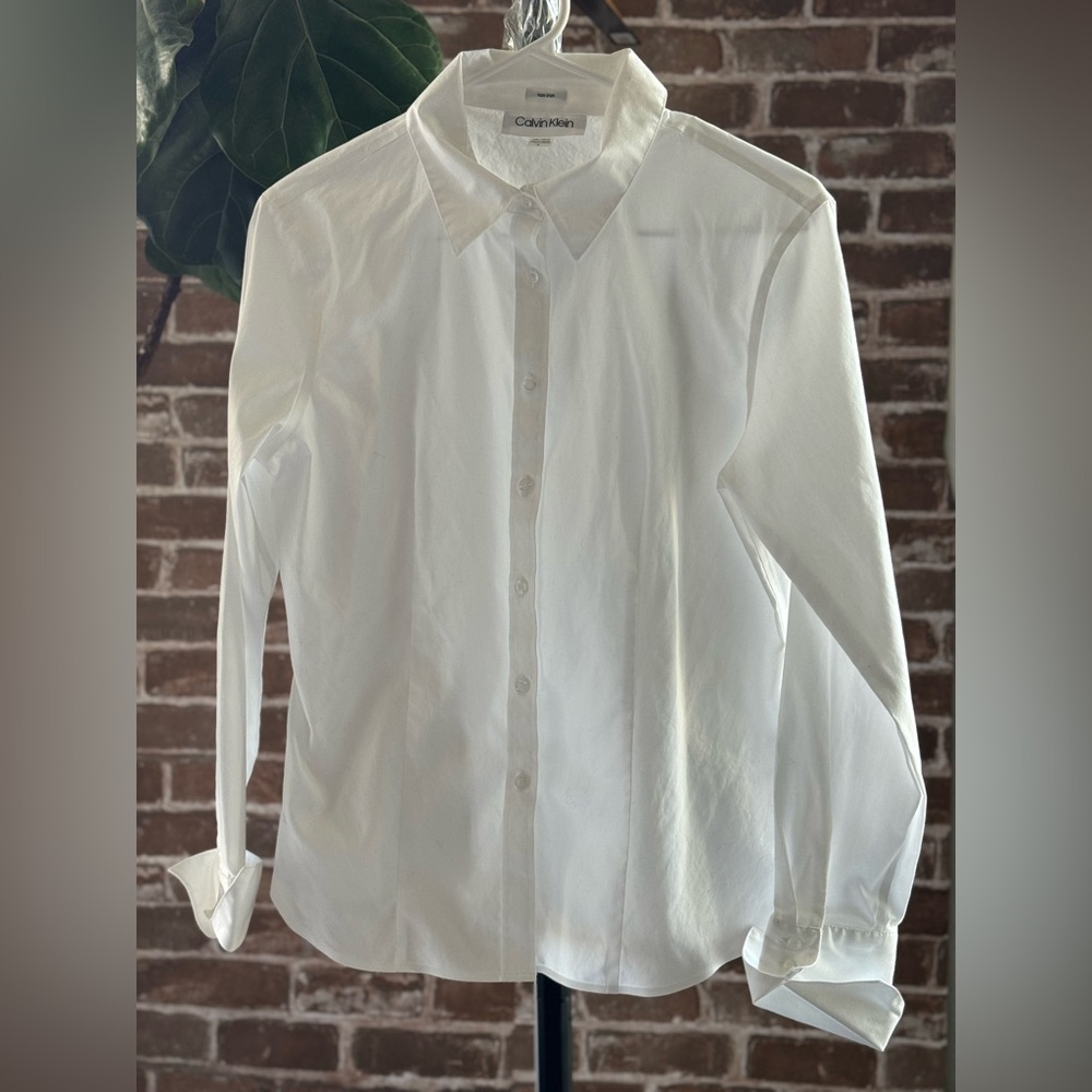 Calvin Klein non-iron women’s long sleeved shirt.